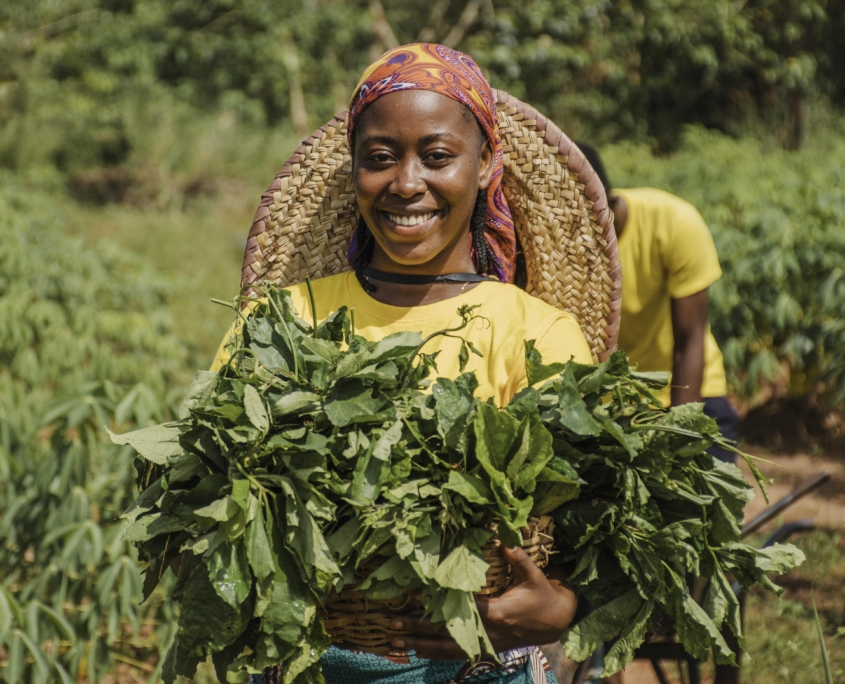 countryside-woman-holding-plant-leaves
